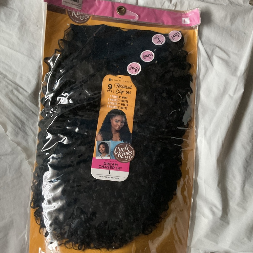 Curly clip ins